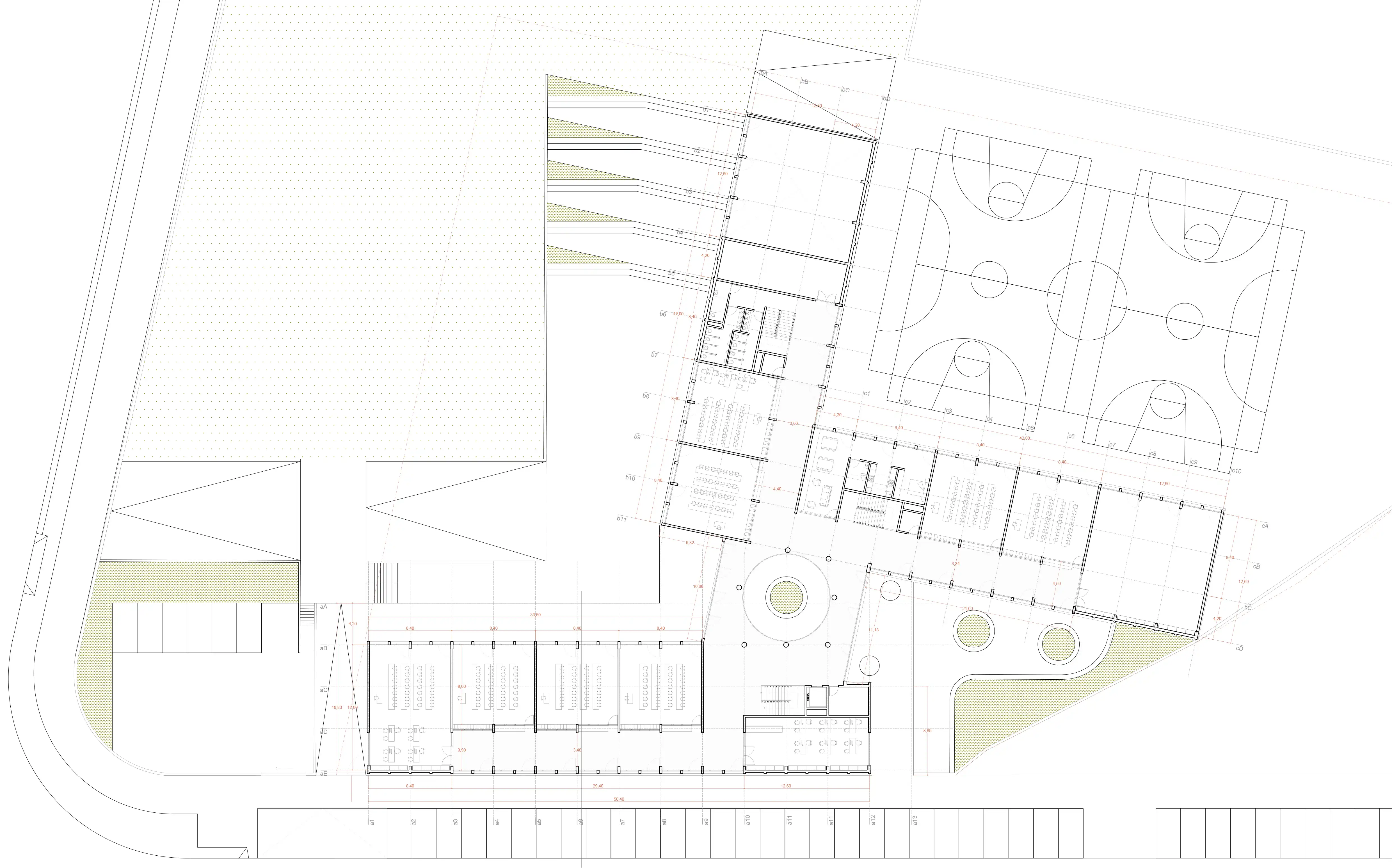 Plano arquitectónico de planta primera detallando la distribución de las aulas y zonas comunes.